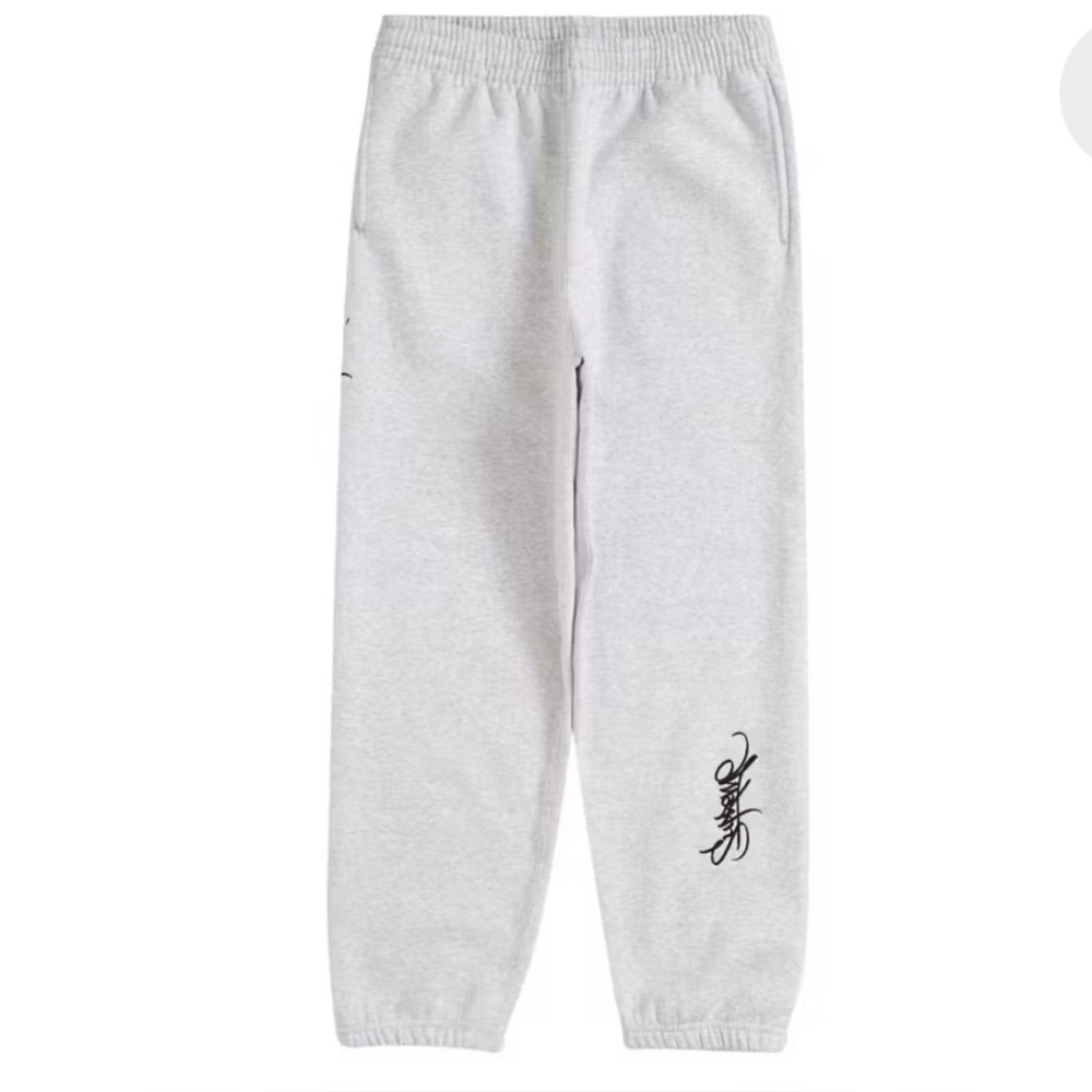 Supreme Tag Sweatpants in Ash Grey.